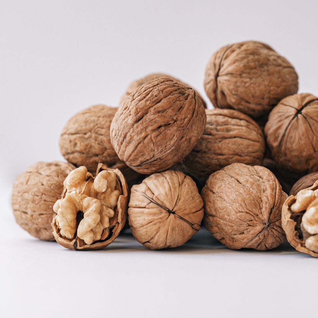 close up of a pile of walnuts