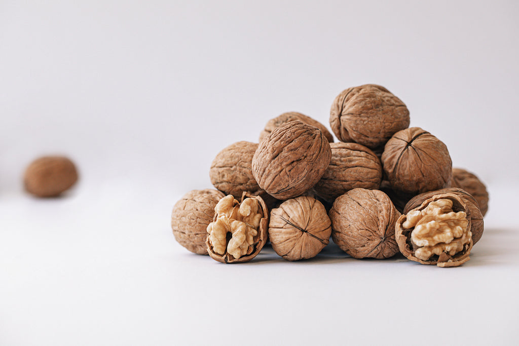 walnuts stacks in a pile